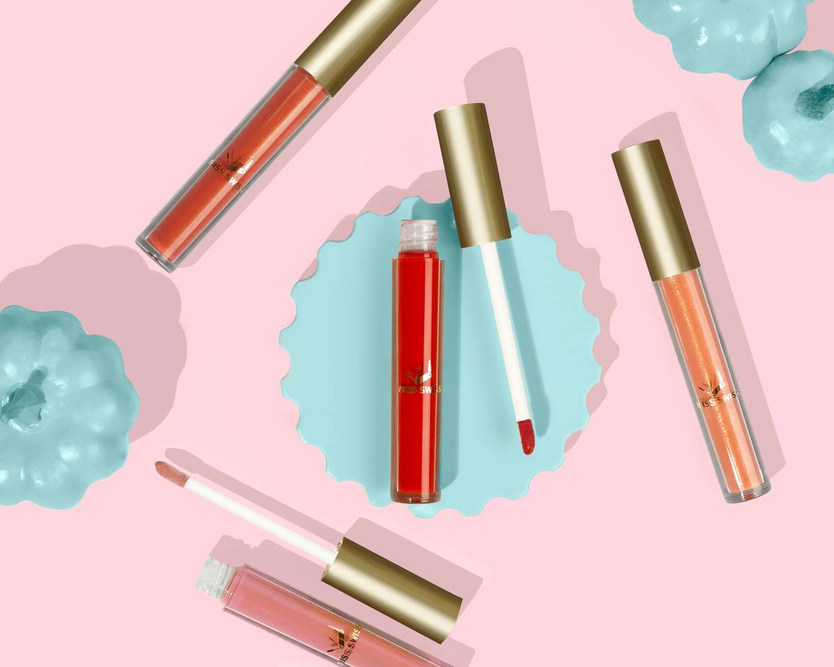 makeup brand social media post showing a flat-lay of clean beauty products, a handwritten caption card reading 'My AM Supplement Stack + Why It Works', and an overlayed green checkmark graphic